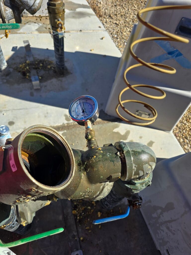 Backflow preventer on a water service line during repair