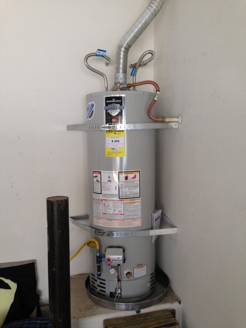 New gas water heater installed with seismic straps by DMS Plumbing in Las Vegas